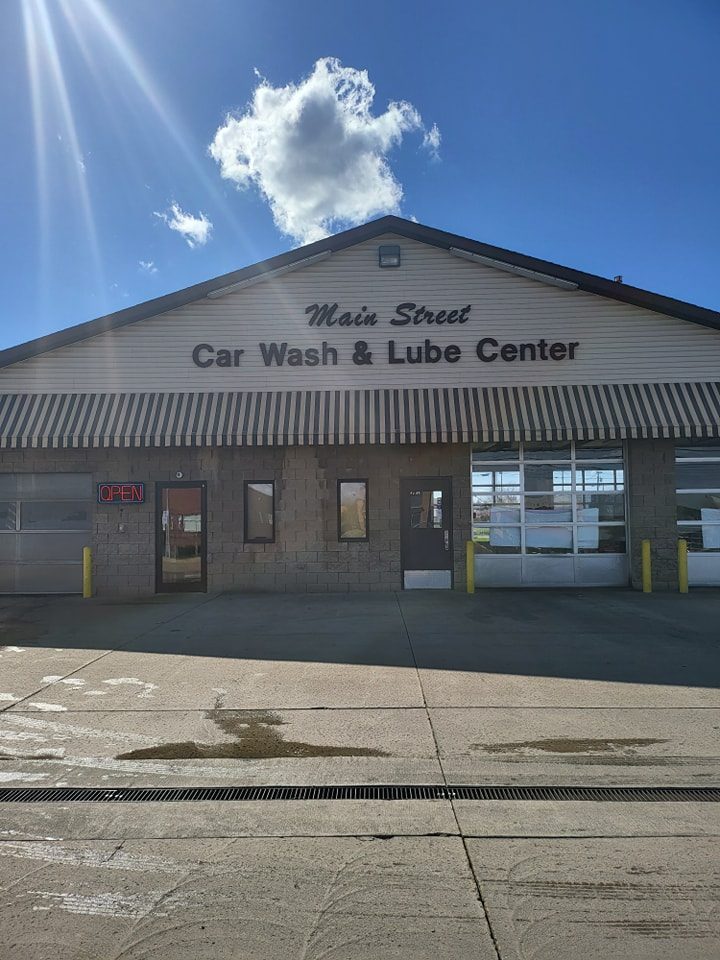 Main Street Car Wash & Lube Center storefront on a clear day in Orrville, Ohio